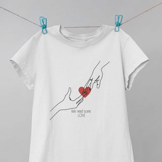 We Need Some Love Women's short sleeve t-shirt iAngelArt Shirts & Tops